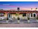 Backyard patio area with elegant staging of furniture and plants under a charming pergola for serene outdoor living at 160 Coastal Pier Ct, Henderson, NV 89002
