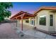 Spacious backyard featuring a covered patio area and low maintenance desert landscaping at 160 Coastal Pier Ct, Henderson, NV 89002