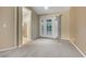 Bedroom with neutral carpet and access to the backyard patio at 160 Coastal Pier Ct, Henderson, NV 89002