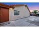 Exterior side of home with stucco and a covered patio at 160 Coastal Pier Ct, Henderson, NV 89002