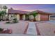 Beautiful single-story home with desert landscaping, a two-car garage, and a tile roof at 160 Coastal Pier Ct, Henderson, NV 89002
