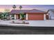 Charming single-story home featuring a desert landscape, a two-car garage, and a tile roof at 160 Coastal Pier Ct, Henderson, NV 89002