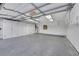 Spacious garage featuring ample storage cabinets and bright lighting at 160 Coastal Pier Ct, Henderson, NV 89002