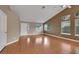 Spacious living room with high ceilings, hardwood floors, and natural light at 160 Coastal Pier Ct, Henderson, NV 89002