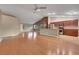 Expansive open-concept living room with hardwood floors and lots of natural light overlooking the kitchen at 160 Coastal Pier Ct, Henderson, NV 89002