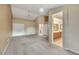 Large carpeted main bedroom shows double door closet, ceiling fan and ensuite bathroom at 160 Coastal Pier Ct, Henderson, NV 89002