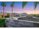 Street view of homes with mountain views in the distance at 160 Coastal Pier Ct, Henderson, NV 89002