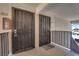 Secured front entrance with gated doors and digital keypad at 2451 N Rainbow Blvd # 2043, Las Vegas, NV 89108
