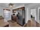 Kitchen features updated appliances, wooden cabinets and an undermount sink at 2451 N Rainbow Blvd # 2043, Las Vegas, NV 89108