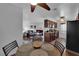 Open floor plan of a dining area, kitchen and living room provides a great flow for entertaining at 2451 N Rainbow Blvd # 2043, Las Vegas, NV 89108
