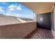 Enclosed patio featuring brick floors, a storage closet and view of bridge at 2451 N Rainbow Blvd # 2043, Las Vegas, NV 89108