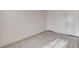 Bedroom featuring light wood floors and two closets at 3322 Dragon Fly St, North Las Vegas, NV 89032