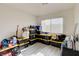 Neutral-toned room with blinds allowing natural light, offering versatile space for various uses at 3322 Dragon Fly St, North Las Vegas, NV 89032