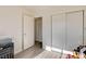 Cozy bedroom showcases a closet, light-colored walls, and modern flooring, perfect for relaxation at 3322 Dragon Fly St, North Las Vegas, NV 89032