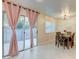 Dining area with access to the backyard and views of the dining table at 3322 Dragon Fly St, North Las Vegas, NV 89032