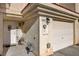 Charming home exterior featuring a well-maintained front entrance, garage, and street number at 3322 Dragon Fly St, North Las Vegas, NV 89032