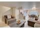 Inviting living area showcases an open floor plan with a kitchen and dining room at 3322 Dragon Fly St, North Las Vegas, NV 89032