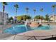 A beautifully maintained community pool with lush landscaping, perfect for relaxation at 3322 Dragon Fly St, North Las Vegas, NV 89032
