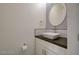 Stylish half bath featuring a unique vessel sink, modern fixtures, and clean, minimalist design at 3412 Adventure Ct, Las Vegas, NV 89129