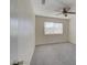 Neutral bedroom with carpet, ceiling fan, and window view at 3412 Adventure Ct, Las Vegas, NV 89129