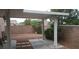 Enclosed backyard featuring a covered patio and mature landscaping, perfect for outdoor entertaining at 3416 Mountain Park St, Las Vegas, NV 89129