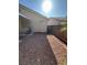 A spacious backyard featuring low-maintenance rock landscaping, providing a serene outdoor living space at 3416 Mountain Park St, Las Vegas, NV 89129