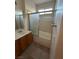 Bathroom featuring a shower-tub combo and vanity with a mirror and granite counters at 3416 Mountain Park St, Las Vegas, NV 89129