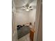 Empty bedroom featuring tile flooring, a ceiling fan, and a single window at 3416 Mountain Park St, Las Vegas, NV 89129