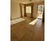 Bright bedroom featuring tile flooring, a window with coverings, and a glass door at 3416 Mountain Park St, Las Vegas, NV 89129