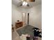 Standard bedroom with a ceiling fan and an open closet showcasing the bedroom's neutral palette at 3416 Mountain Park St, Las Vegas, NV 89129