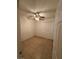 A bedroom with a ceiling fan and tile floors with a bright window at 3416 Mountain Park St, Las Vegas, NV 89129