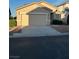 Single-Gathering home featuring a two-car garage, low-maintenance landscaping, and neutral-colored exterior at 3416 Mountain Park St, Las Vegas, NV 89129