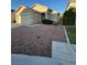 Charming single-story house with gravel landscaping, and a covered entrance, offering easy maintenance and curb appeal at 3416 Mountain Park St, Las Vegas, NV 89129