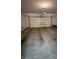 Attached garage with roll-up door and plenty of space for vehicle parking at 3416 Mountain Park St, Las Vegas, NV 89129