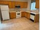 Bright kitchen features stainless appliances and wood cabinetry at 3416 Mountain Park St, Las Vegas, NV 89129