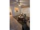 Living room showcasing an open floor plan to kitchen with natural light and a tile flooring at 3416 Mountain Park St, Las Vegas, NV 89129