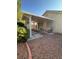 View of a covered patio, featuring a concrete walkway and gravel, great for outdoor seating at 3416 Mountain Park St, Las Vegas, NV 89129