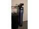 Water softener system with black resin tank for whole-house water filtration at 3416 Mountain Park St, Las Vegas, NV 89129