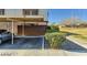 View of carport for home, with parking spot and landscaping, showing the attached carport structure at 3441 Villa Way, Las Vegas, NV 89120