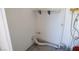 This is an empty laundry room with pipes and a shelf at 3441 Villa Way, Las Vegas, NV 89120