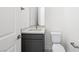 Bathroom with modern sink, gray cabinet, and a sleek, modern design at 362 Tigullio Ave, Henderson, NV 89011