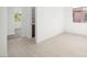 Bright entryway featuring modern light wood floors, leading to a hallway and window view at 362 Tigullio Ave, Henderson, NV 89011