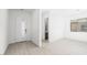Bright entryway featuring modern light wood floors, leading to a hallway and window view at 362 Tigullio Ave, Henderson, NV 89011