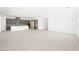 Large open concept living room with a modern kitchen and plenty of natural light at 362 Tigullio Ave, Henderson, NV 89011