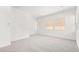 Large main bedroom with neutral carpet and plenty of natural light from multiple windows at 362 Tigullio Ave, Henderson, NV 89011