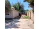 Backyard featuring a concrete patio enclosed by a brick fence at 4931 Nevada Ave, Las Vegas, NV 89104