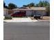 Modest single story home featuring a quaint front yard and ample parking at 4931 Nevada Ave, Las Vegas, NV 89104
