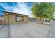 Spacious driveway, partially gated, in front of a charming single-story home at 520 Prince Alan Ct, Las Vegas, NV 89110