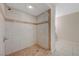 Shower with decorative tile, tiled flooring and modern fixtures at 520 Prince Alan Ct, Las Vegas, NV 89110