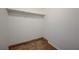 Walk-in closet with carpeted floor and white shelving at 520 Prince Alan Ct, Las Vegas, NV 89110
